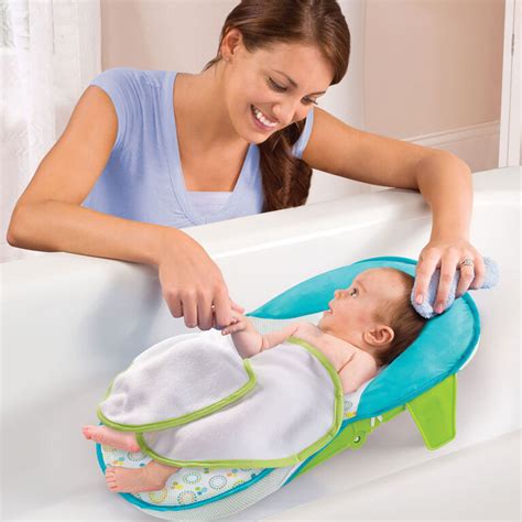 The inclined, no-slip seat comfortably cradles your baby with raised mesh sides that help them (and you) feel more secure. . Summer bath sling